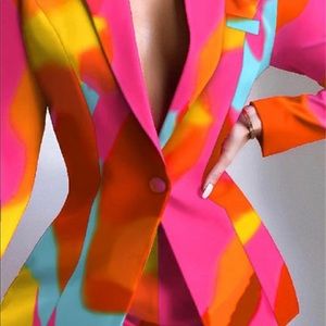 Bright multi color jacket & matching shorts; never worn with tags. XL-XXL sized